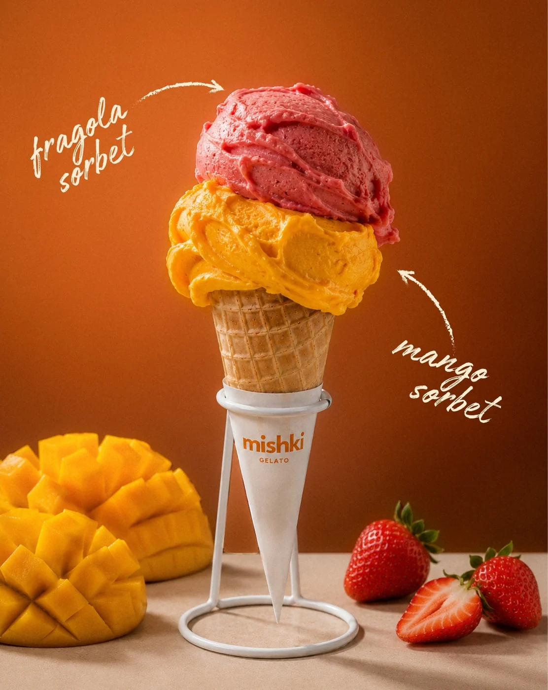 Double-scoop cone: Fragola sorbet and Mango sorbet